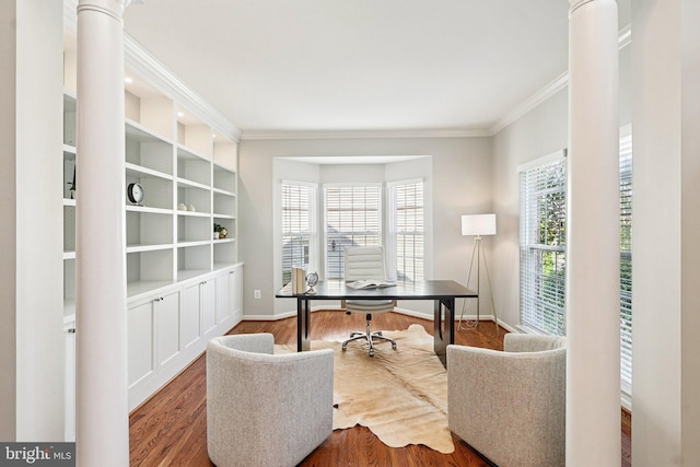 5570 La Vista Dr, Alexandria, VA 22310 - home office featuring wood finished floors, ornamental molding, built in shelves, and ornate columns