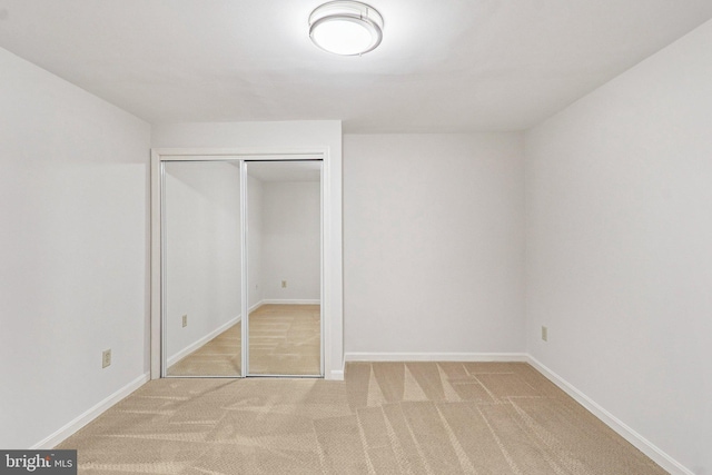 5570 La Vista Dr, Alexandria, VA 22310 - unfurnished bedroom featuring light colored carpet and a closet