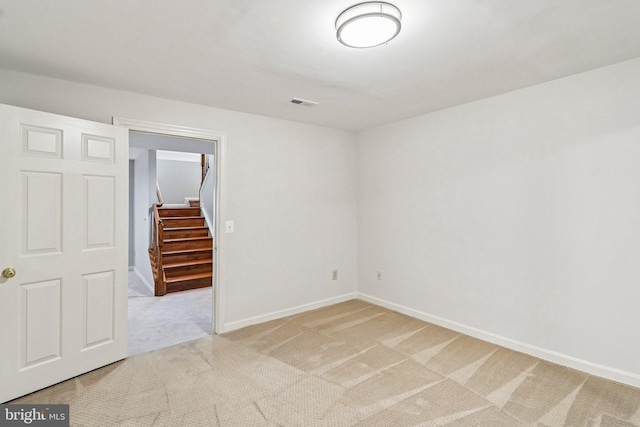 5570 La Vista Dr, Alexandria, VA 22310 - spare room with light colored carpet and stairs