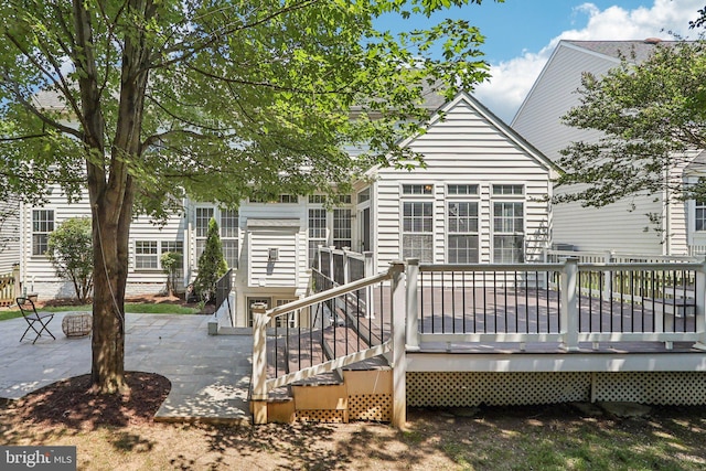 5570 La Vista Dr, Alexandria, VA 22310 - rear view of house featuring a patio and a deck