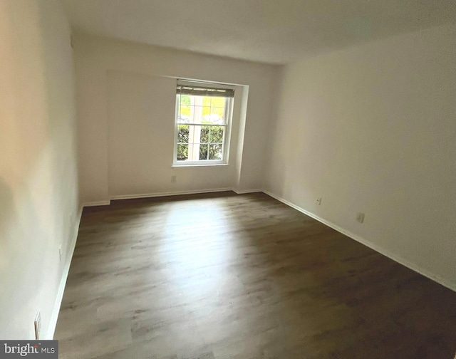 7720 Tremayne Pl Unit 107, Mclean, VA 22102 - empty room with dark wood-type flooring