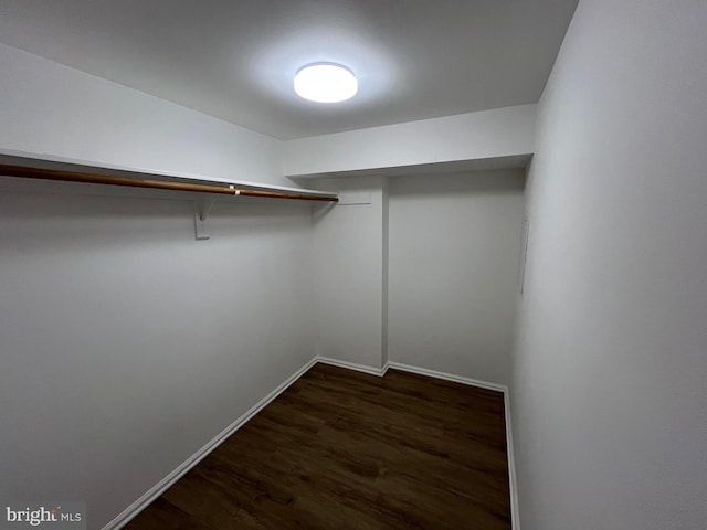 7720 Tremayne Pl Unit 107, Mclean, VA 22102 - spacious closet featuring dark wood-type flooring