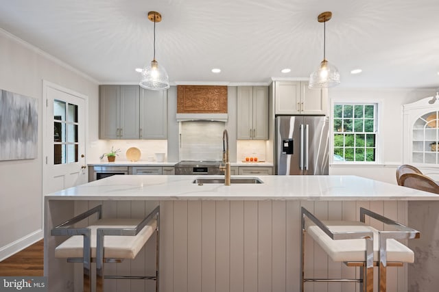 7819 Overbrook, Ruxton, MD 21204 - kitchen with stainless steel fridge with ice dispenser, backsplash, a breakfast bar, dark wood-type flooring, and light stone countertops