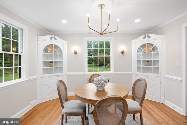 7819 Overbrook, Ruxton, MD 21204 - dining room with a chandelier, light wood-style flooring, plenty of natural light, and crown molding