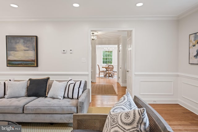 7819 Overbrook, Ruxton, MD 21204 - living area featuring wood finished floors, ornamental molding, recessed lighting, and wainscoting