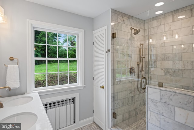 7819 Overbrook, Ruxton, MD 21204 - full bathroom with radiator, plenty of natural light, a shower stall, double vanity, and recessed lighting
