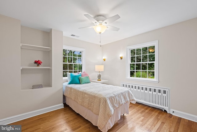 7819 Overbrook, Ruxton, MD 21204 - bedroom with radiator heating unit, wood finished floors, and ceiling fan