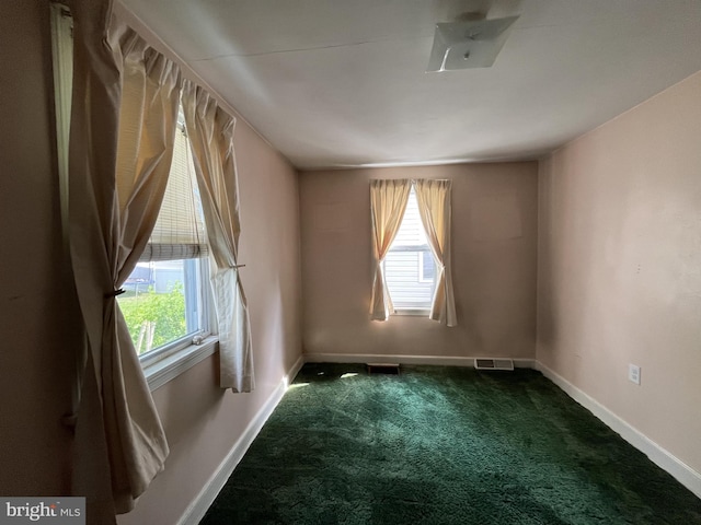 2100 Lincoln Ave, Wilmington, DE 19809 - spare room featuring dark carpet and healthy amount of natural light