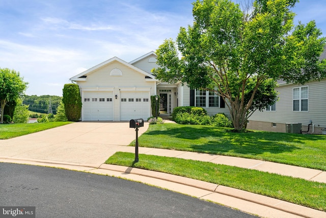 3709 Apple Cider Ct, Dumfries, VA 22025 - view of front of home featuring a garage, concrete driveway, and a front yard