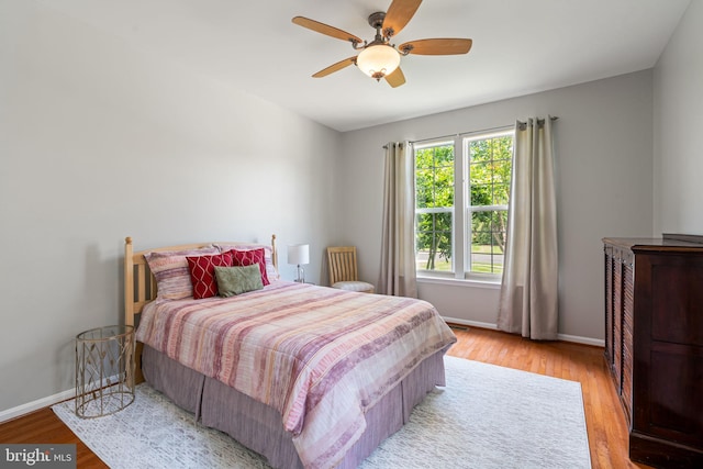 3709 Apple Cider Ct, Dumfries, VA 22025 - bedroom featuring light wood-type flooring and a ceiling fan