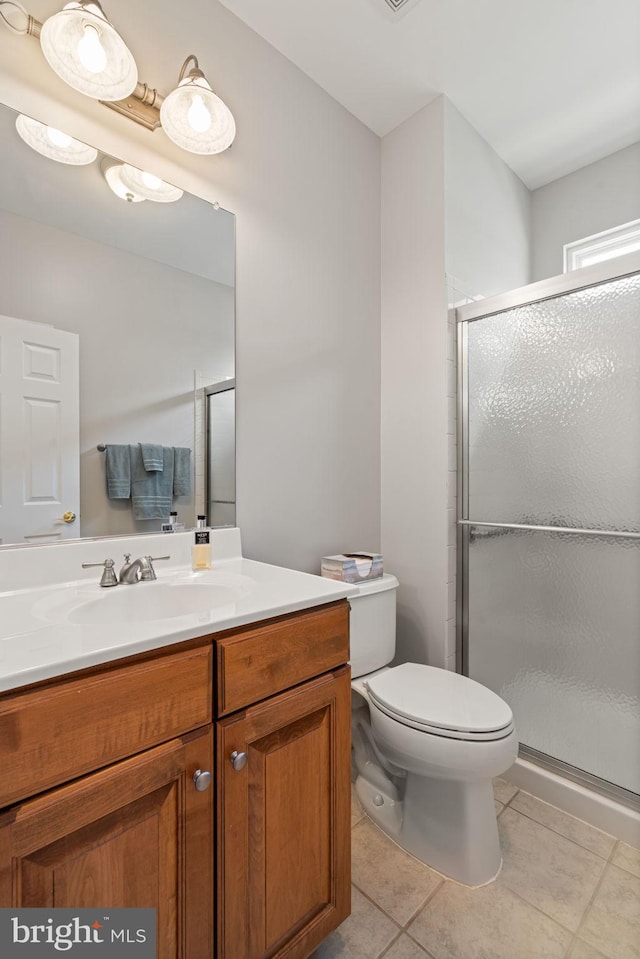 3709 Apple Cider Ct, Dumfries, VA 22025 - bathroom with vanity, a stall shower, and tile patterned floors
