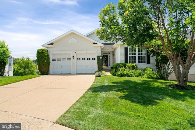 3709 Apple Cider Ct, Dumfries, VA 22025 - view of front of home featuring an attached garage, driveway, and a front yard