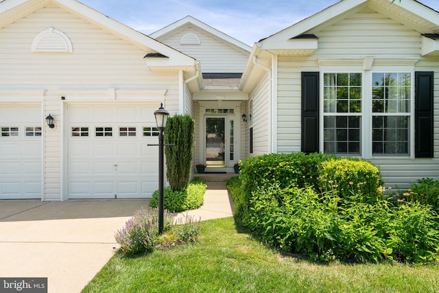 3709 Apple Cider Ct, Dumfries, VA 22025 - view of front of property featuring driveway and a garage