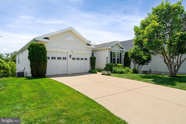 3709 Apple Cider Ct, Dumfries, VA 22025 - view of front of house featuring driveway, a front yard, a garage, and roof with shingles