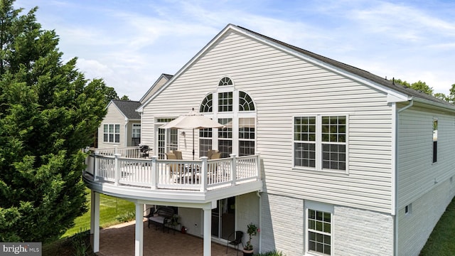 3709 Apple Cider Ct, Dumfries, VA 22025 - back of house featuring a deck and a patio area