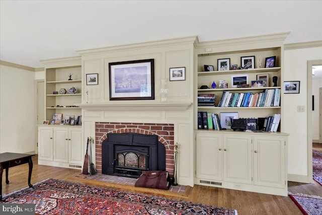 154 Deer Hill Rd, Reading, PA 19607 - living room with wood finished floors, ornamental molding, and built in features