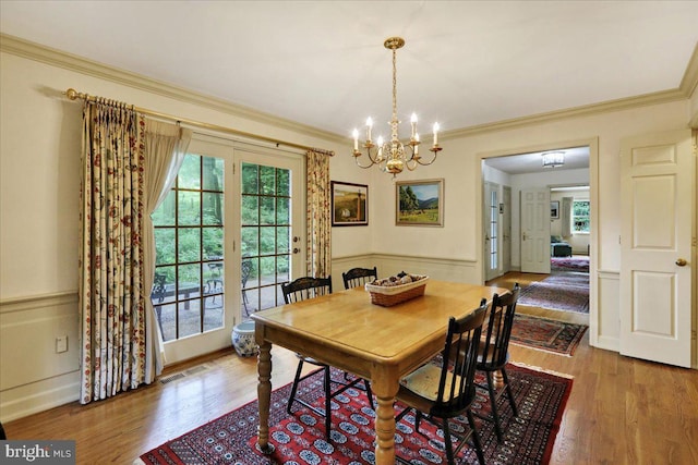 154 Deer Hill Rd, Reading, PA 19607 - dining area with a chandelier, wood finished floors, and ornamental molding