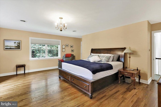 154 Deer Hill Rd, Reading, PA 19607 - bedroom featuring a chandelier and wood finished floors