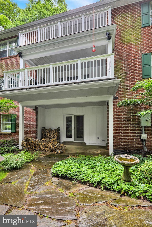 154 Deer Hill Rd, Reading, PA 19607 - rear view of house with a balcony and brick siding