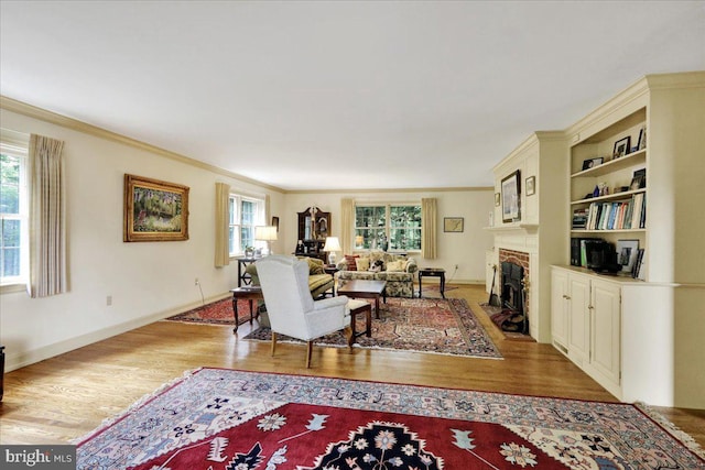154 Deer Hill Rd, Reading, PA 19607 - living room with plenty of natural light, crown molding, wood finished floors, and a fireplace with flush hearth
