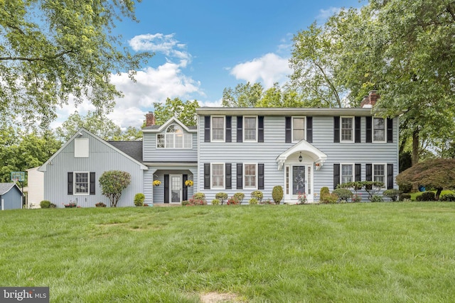 69 Hickory Ln, Chalfont, PA 18914 - colonial house with a chimney and a front yard