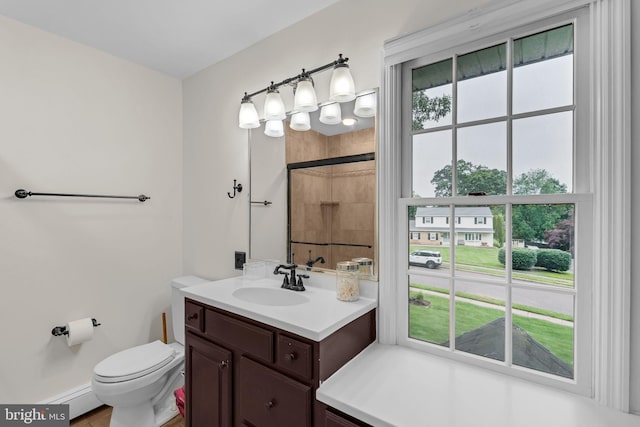 69 Hickory Ln, Chalfont, PA 18914 - bathroom featuring vanity, tiled shower, and a baseboard heating unit
