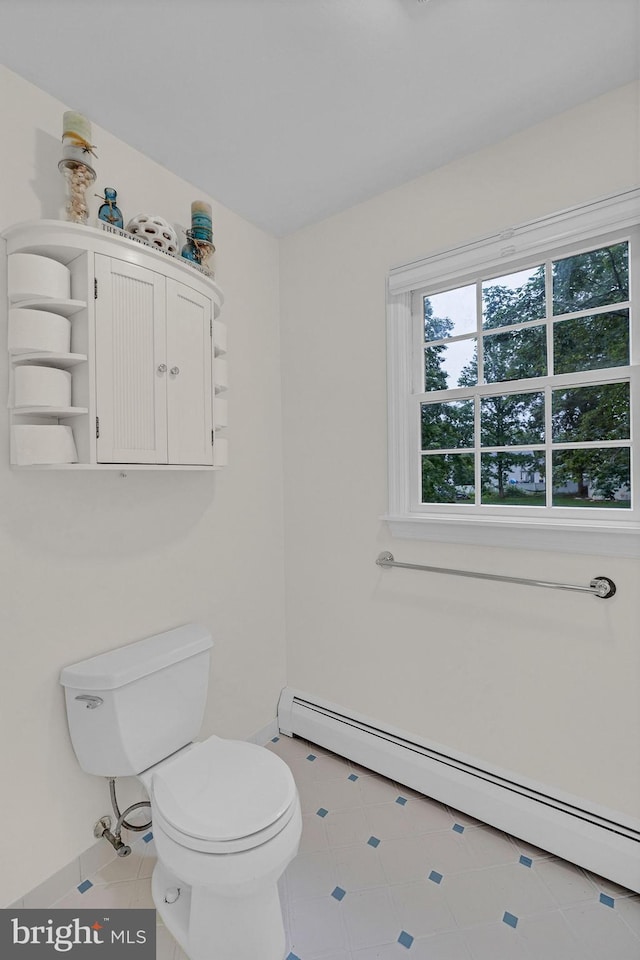 69 Hickory Ln, Chalfont, PA 18914 - half bath featuring a baseboard radiator and tile patterned flooring