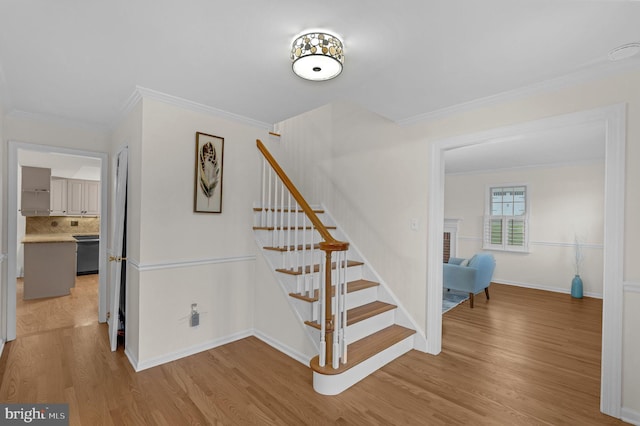 69 Hickory Ln, Chalfont, PA 18914 - stairs with ornamental molding and wood finished floors