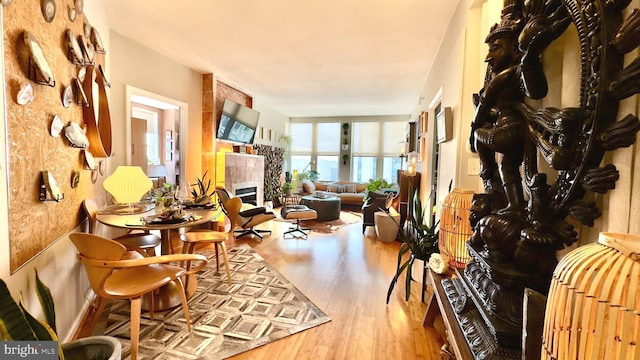 715 6th St NW Unit 1002, Washington, DC 20001 - living area with wood finished floors and a tile fireplace
