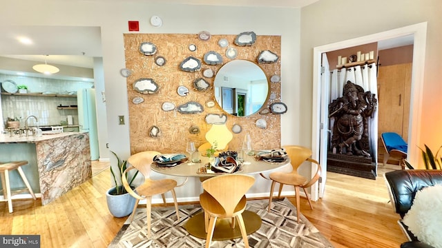 715 6th St NW Unit 1002, Washington, DC 20001 - dining space featuring light wood-style flooring