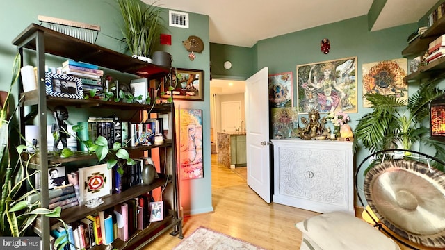 715 6th St NW Unit 1002, Washington, DC 20001 - sitting room featuring wood finished floors