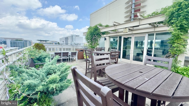 715 6th St NW Unit 1002, Washington, DC 20001 - wooden deck with outdoor dining space
