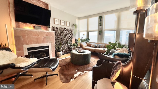 715 6th St NW Unit 1002, Washington, DC 20001 - living room with wood finished floors and a fireplace