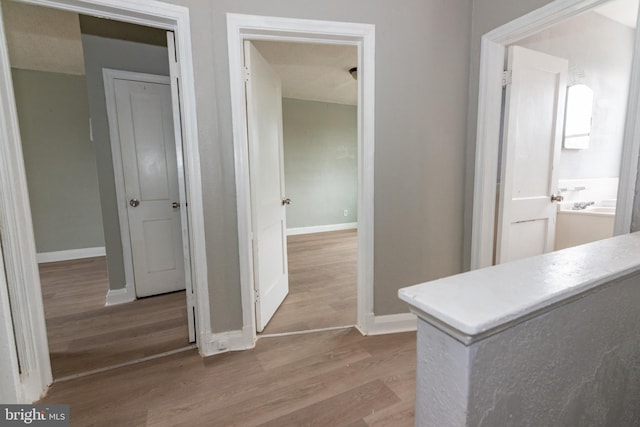 1304 N Linwood Ave, Baltimore, MD 21213 - hall with wood finished floors and baseboards