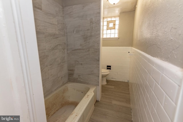 1304 N Linwood Ave, Baltimore, MD 21213 - full bathroom featuring tile walls, wood finished floors, and a wainscoted wall