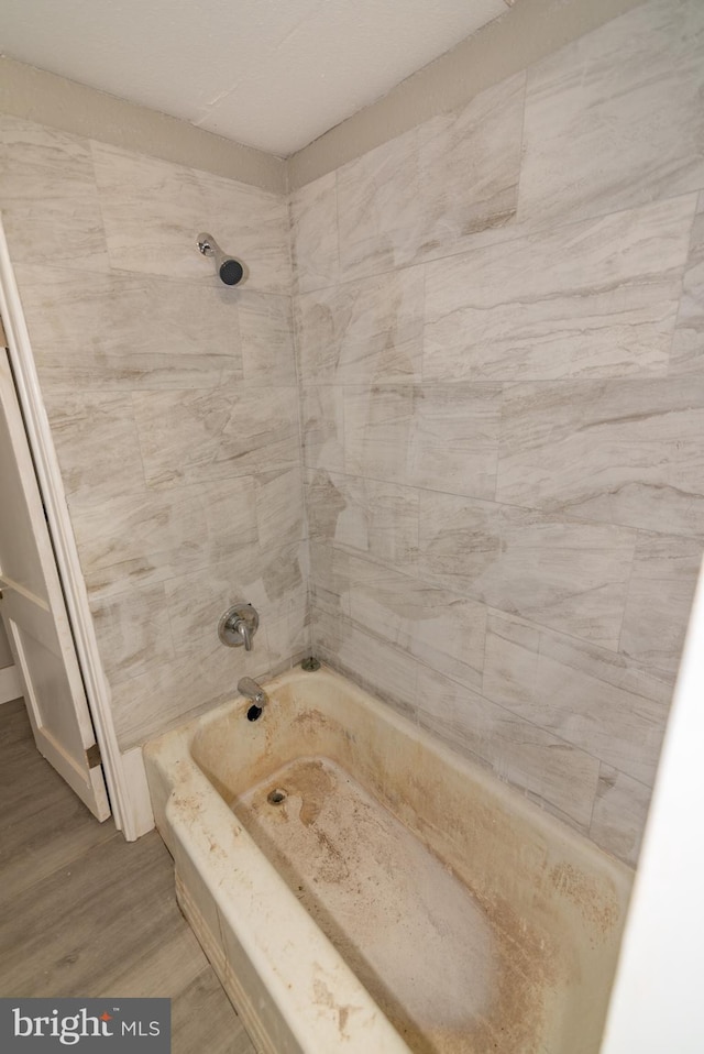 1304 N Linwood Ave, Baltimore, MD 21213 - bathroom with  shower combination and wood finished floors