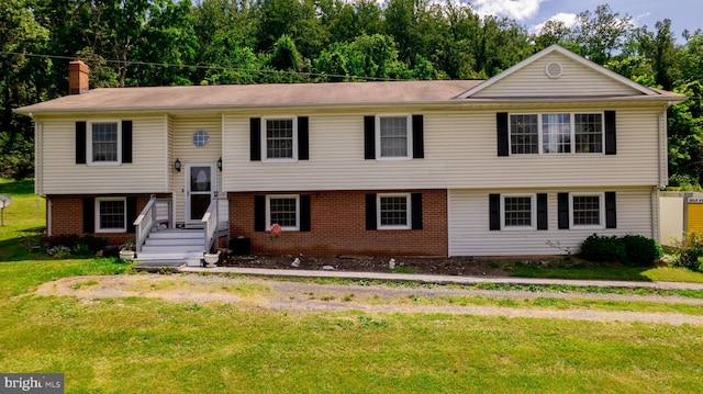 4179 Fiery Run Rd, Linden, VA 22642 - bi-level home with brick siding, a chimney, and a front lawn