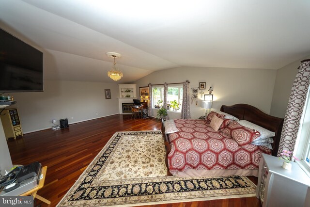 4179 Fiery Run Rd, Linden, VA 22642 - bedroom featuring vaulted ceiling, wood finished floors, and a fireplace