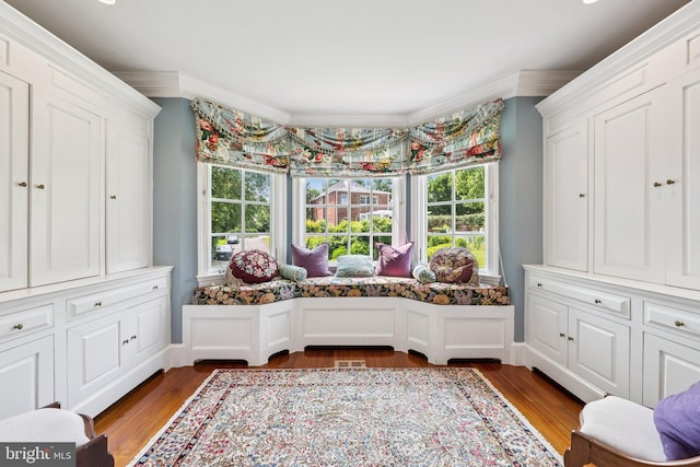 3201/2 Mansion Dr, Alexandria, VA 22302 - living area featuring crown molding, healthy amount of natural light, and wood finished floors