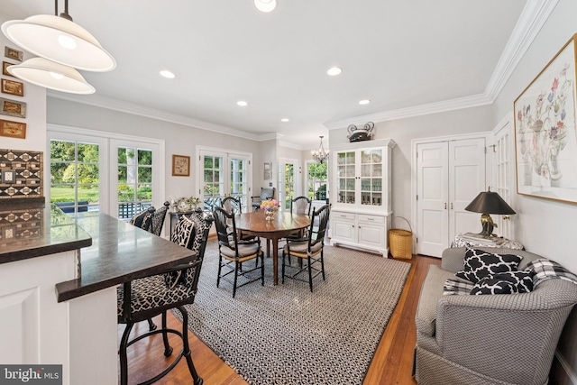 3201/2 Mansion Dr, Alexandria, VA 22302 - dining room with wood finished floors, french doors, recessed lighting, and crown molding