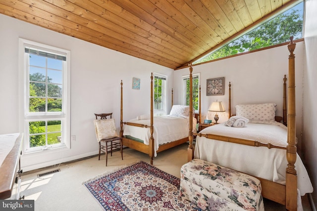 3201/2 Mansion Dr, Alexandria, VA 22302 - carpeted bedroom featuring lofted ceiling, multiple windows, and wood ceiling