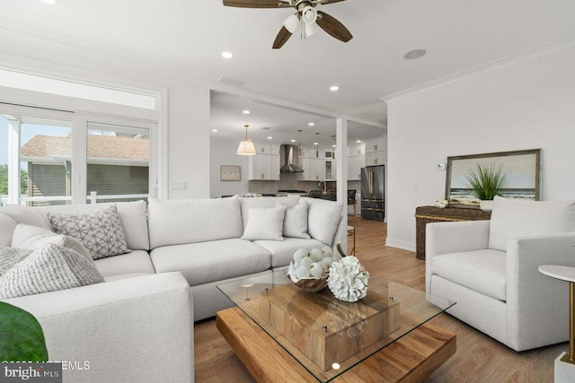 1 Capstan Rd, Waretown, NJ 08758 - living room featuring light wood-type flooring, a ceiling fan, recessed lighting, and ornamental molding