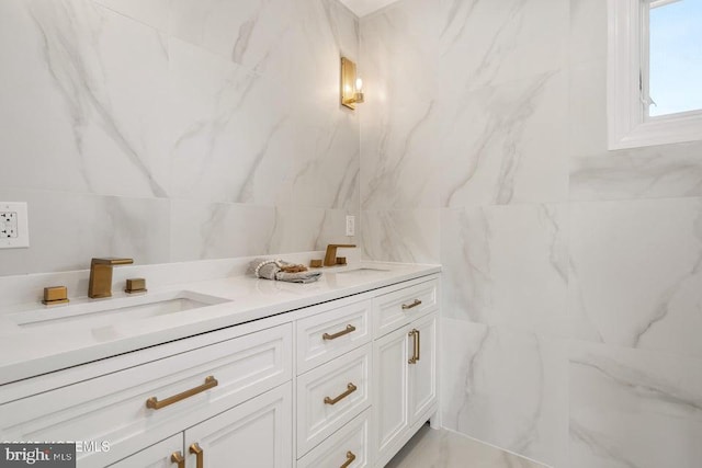1 Capstan Rd, Waretown, NJ 08758 - bathroom featuring double vanity, tile walls, and marble finish floors