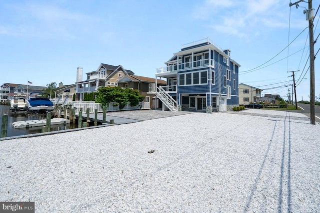 1 Capstan Rd, Waretown, NJ 08758 - view of building exterior with stairs and driveway