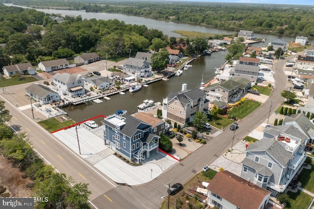 1 Capstan Rd, Waretown, NJ 08758 - aerial perspective of suburban area with a nearby body of water and a heavily wooded area