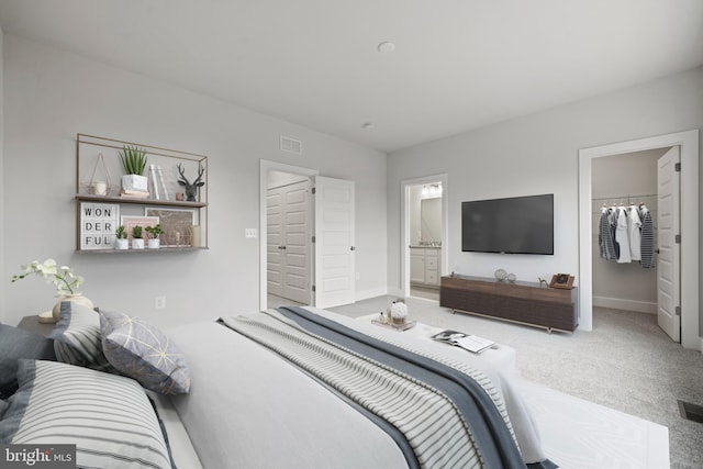 3507 Saint Robin Ln, Bowie, MD 20716 - carpeted bedroom with a spacious closet, a closet, and ensuite bath