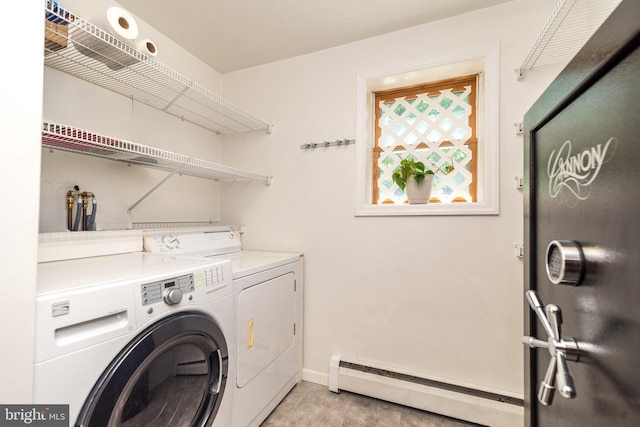 2462 Route Unit 412, Hellertown, PA 18055 - laundry area featuring a baseboard heating unit and washing machine and dryer