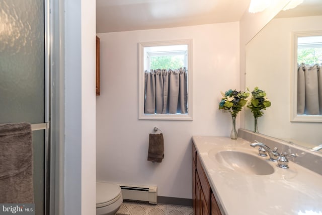 2462 Route Unit 412, Hellertown, PA 18055 - bathroom featuring a baseboard heating unit, vanity, and tile patterned floors