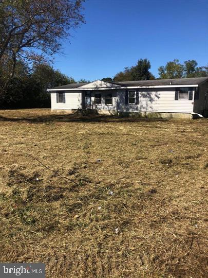 27980 Ruritan Rd, Denton, MD 21629 - rear view of house with a yard