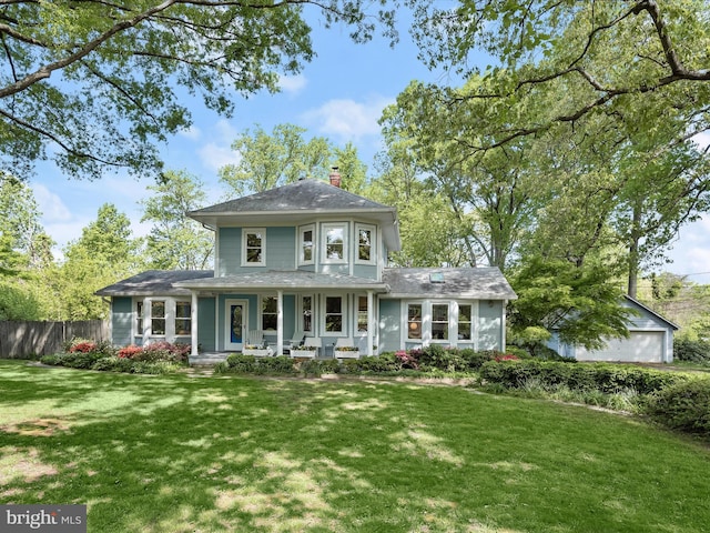 13310 Mockingbird Ln, Bowie, MD 20720 - view of front of home with covered porch, a chimney, and a garage